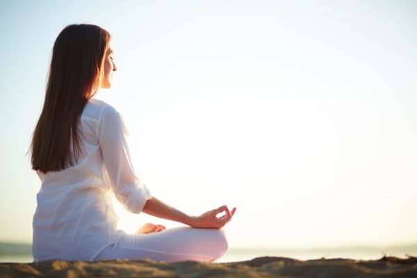 woman sitting Yoga Teacher Training