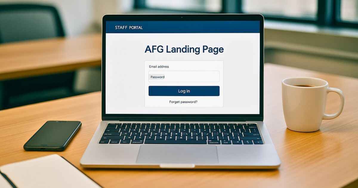 Employee accessing the AFG landing page on laptop in a modern office setting.