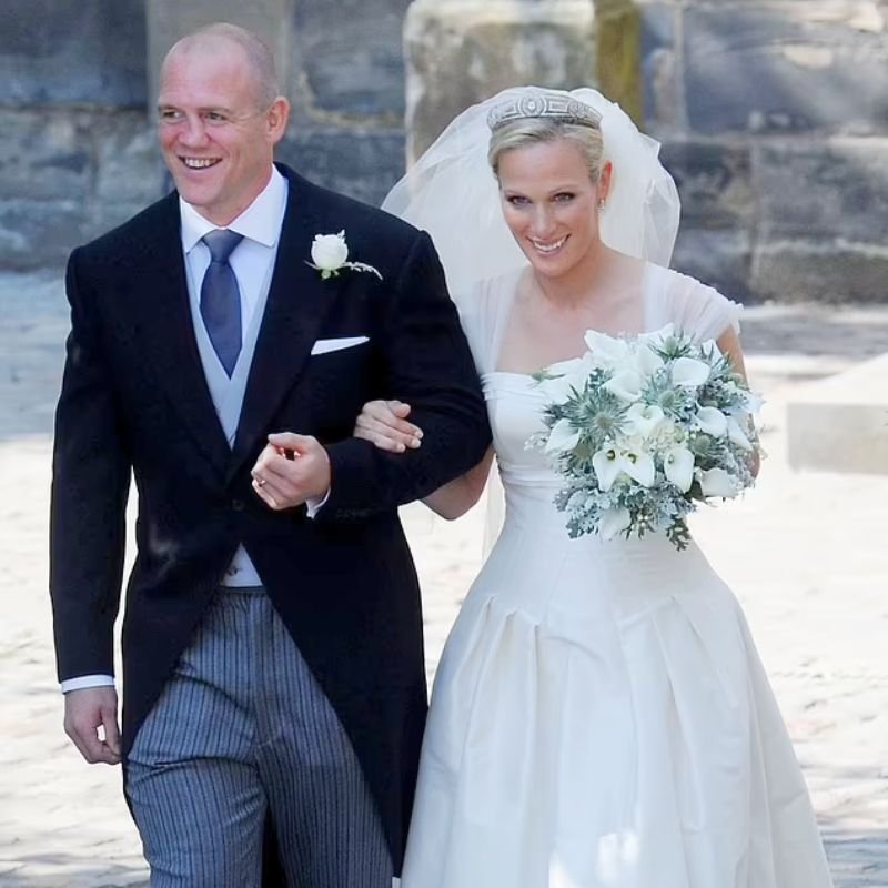 Zara Tindall: Shocking Truth Behind Her Royal Equestrian Life 2 Zara Tindall is walking with Mike Tindall at her marriage day